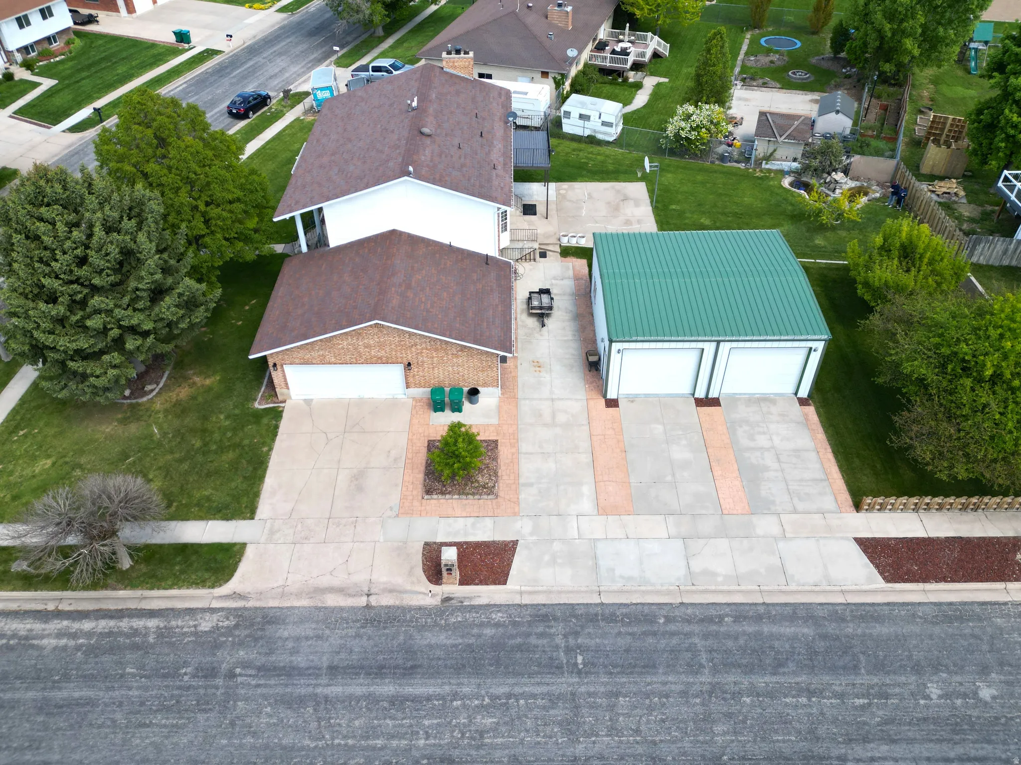 Aerial South side with large garage