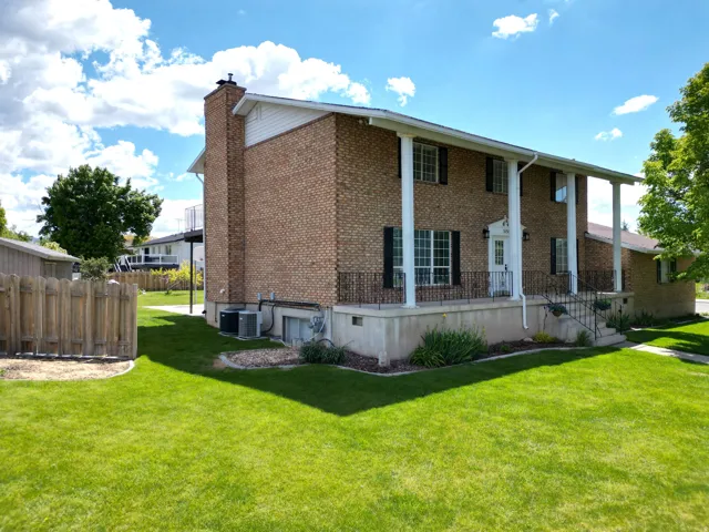 Northwest view of property with covered porch