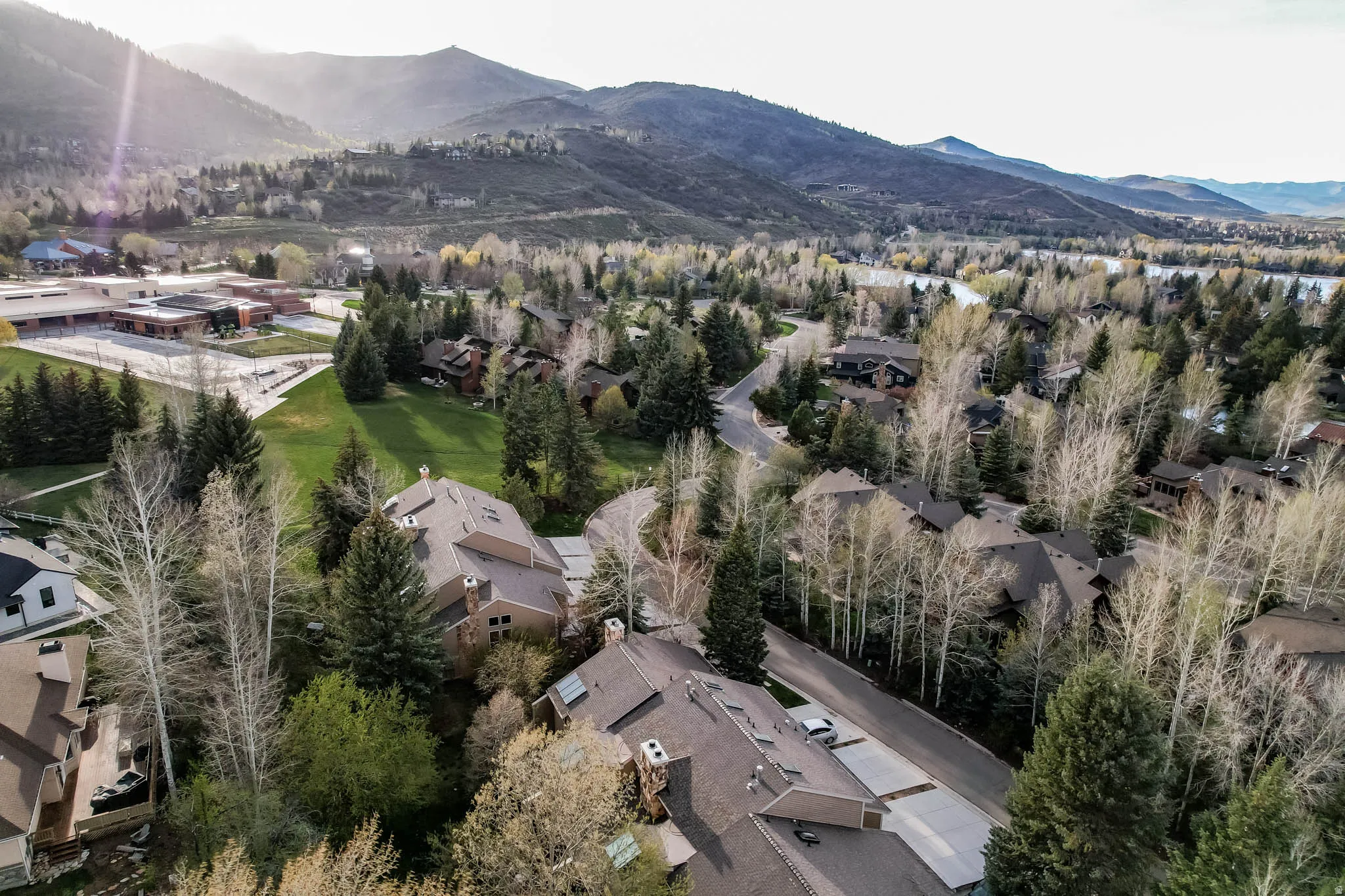 Aerial perspective of suburban area with mountains