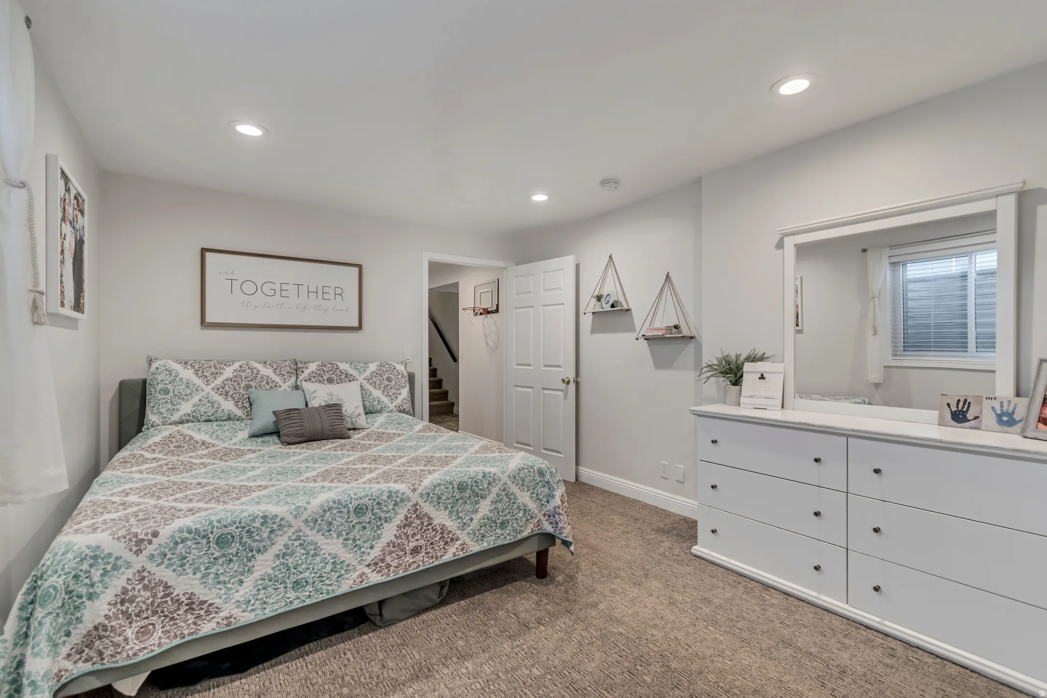 Carpeted bedroom featuring recessed lighting