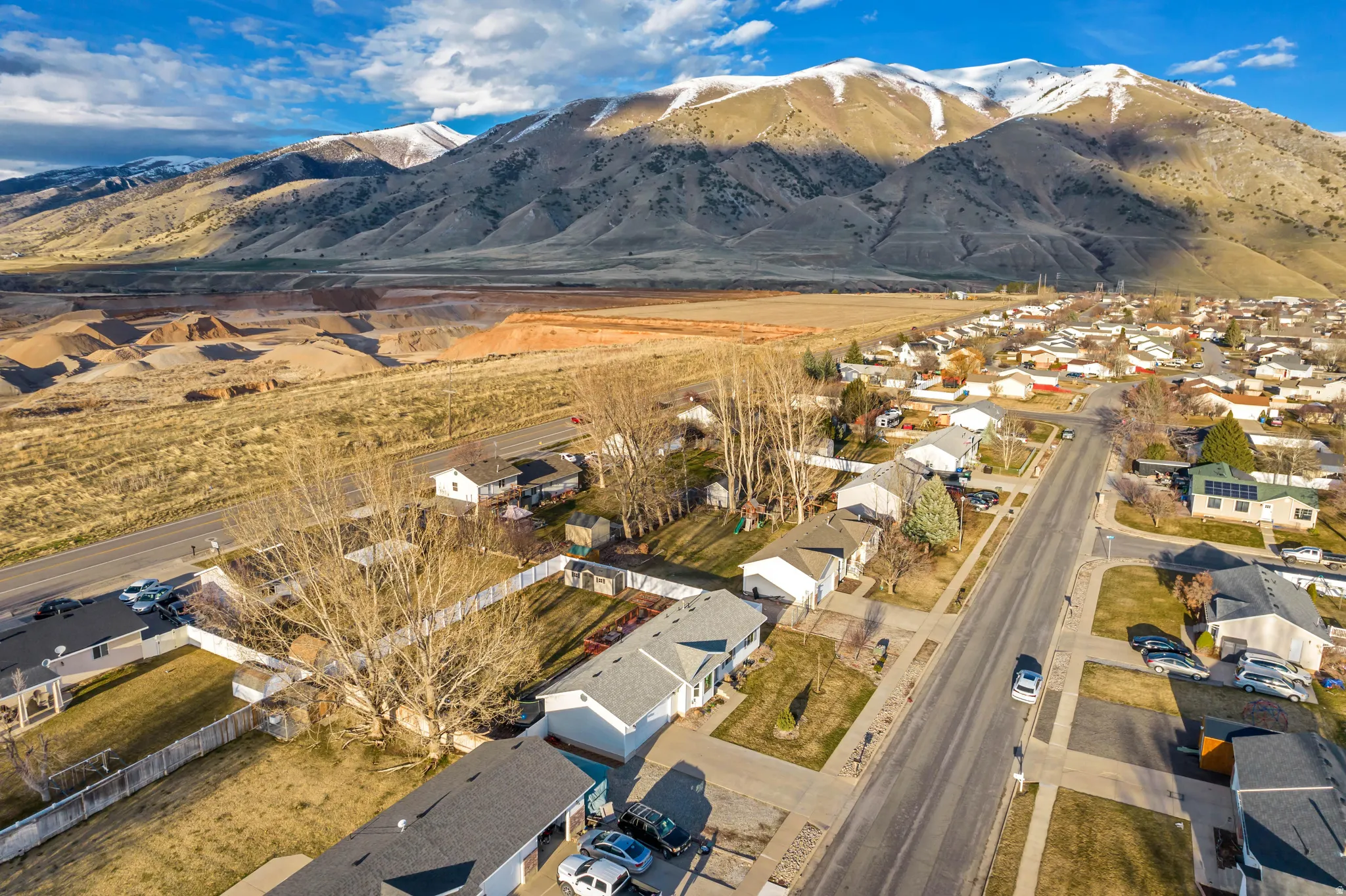 Aerial perspective of suburban area featuring mountains