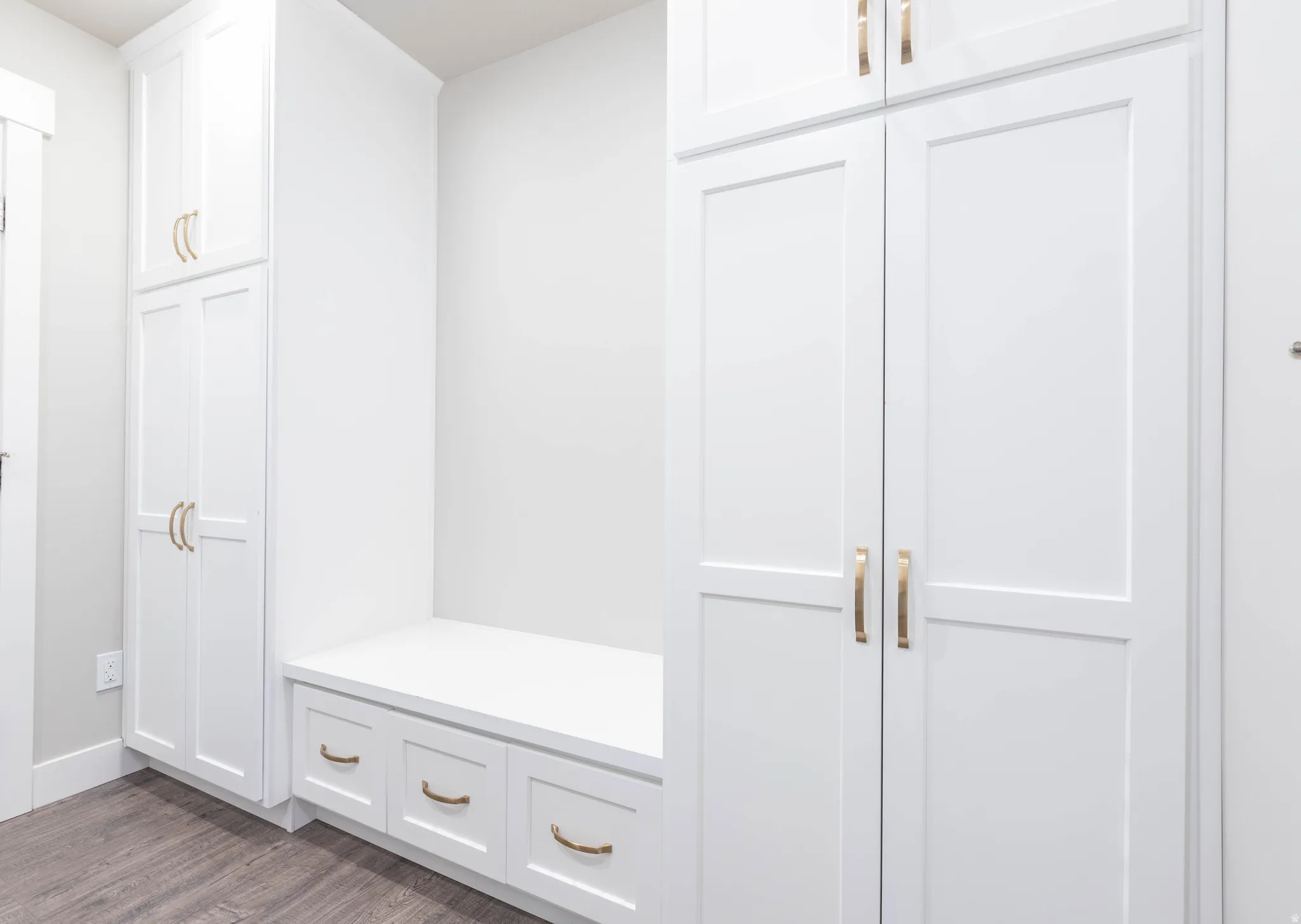 Mudroom with dark wood-type flooring