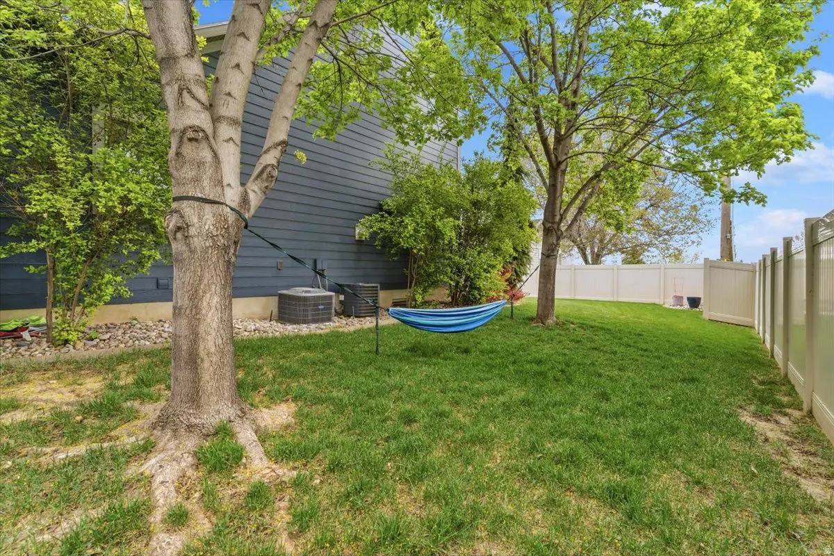 View of fenced backyard