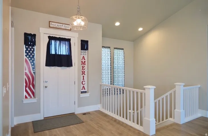 Entrance foyer featuring light wood-style floors and recessed lighting