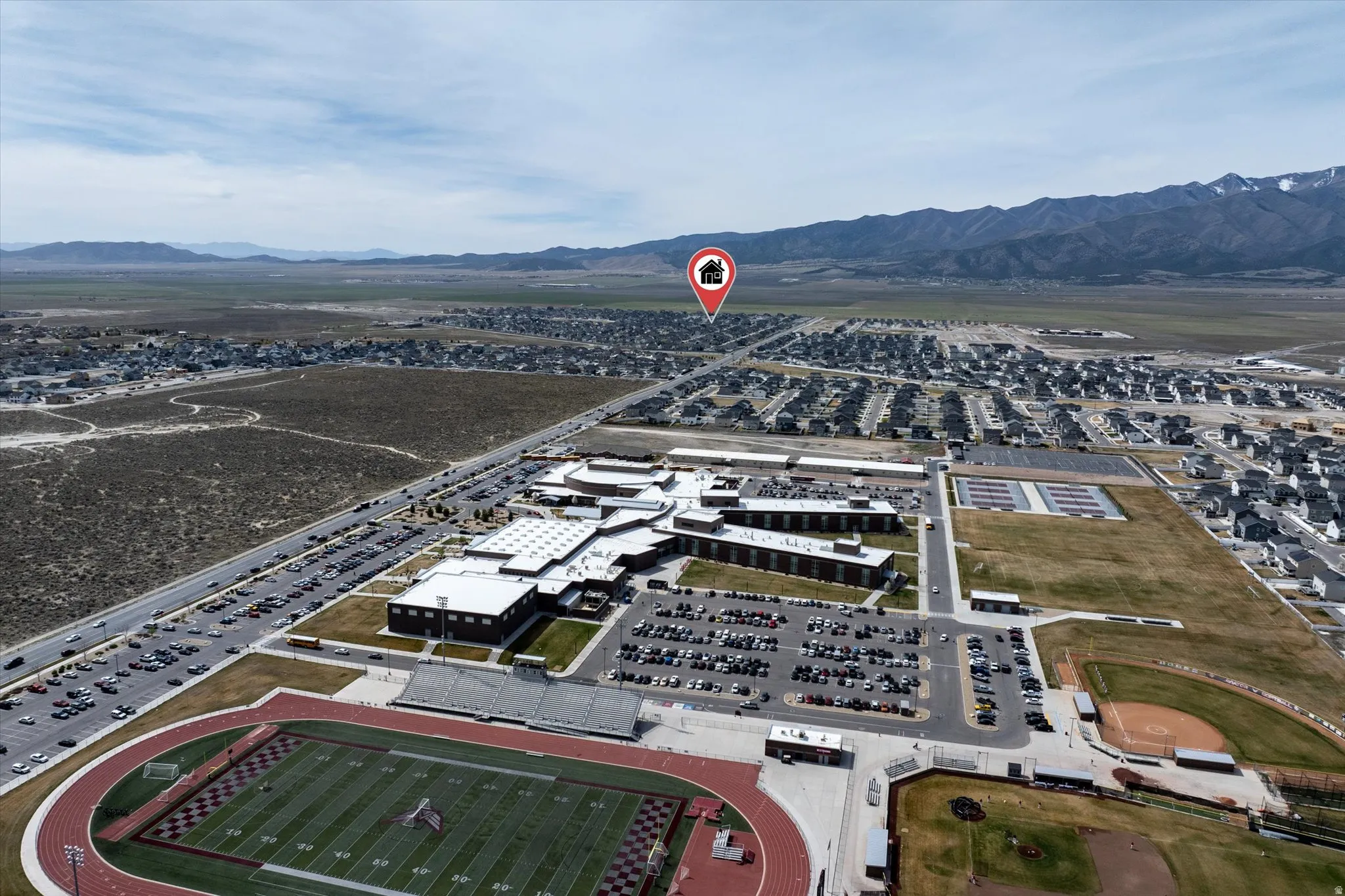 View of property location featuring mountains. Cedar Valley High School