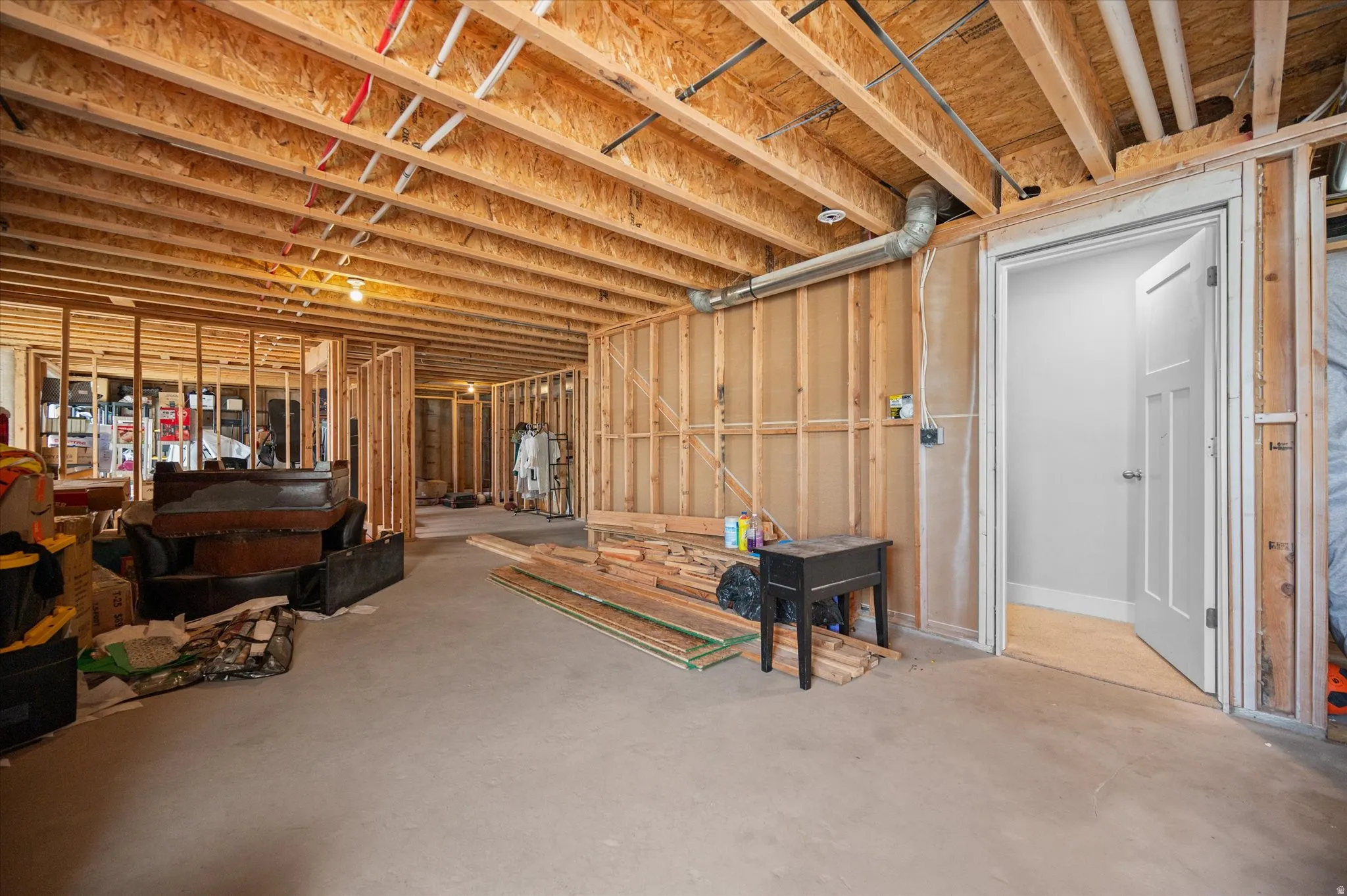 View of unfinished below grade area. Newly framed basement