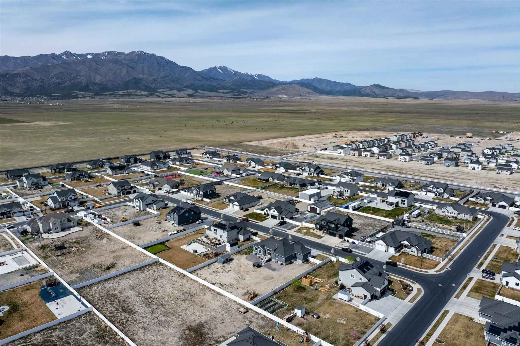 Aerial view of residential area with a mountain backdrop