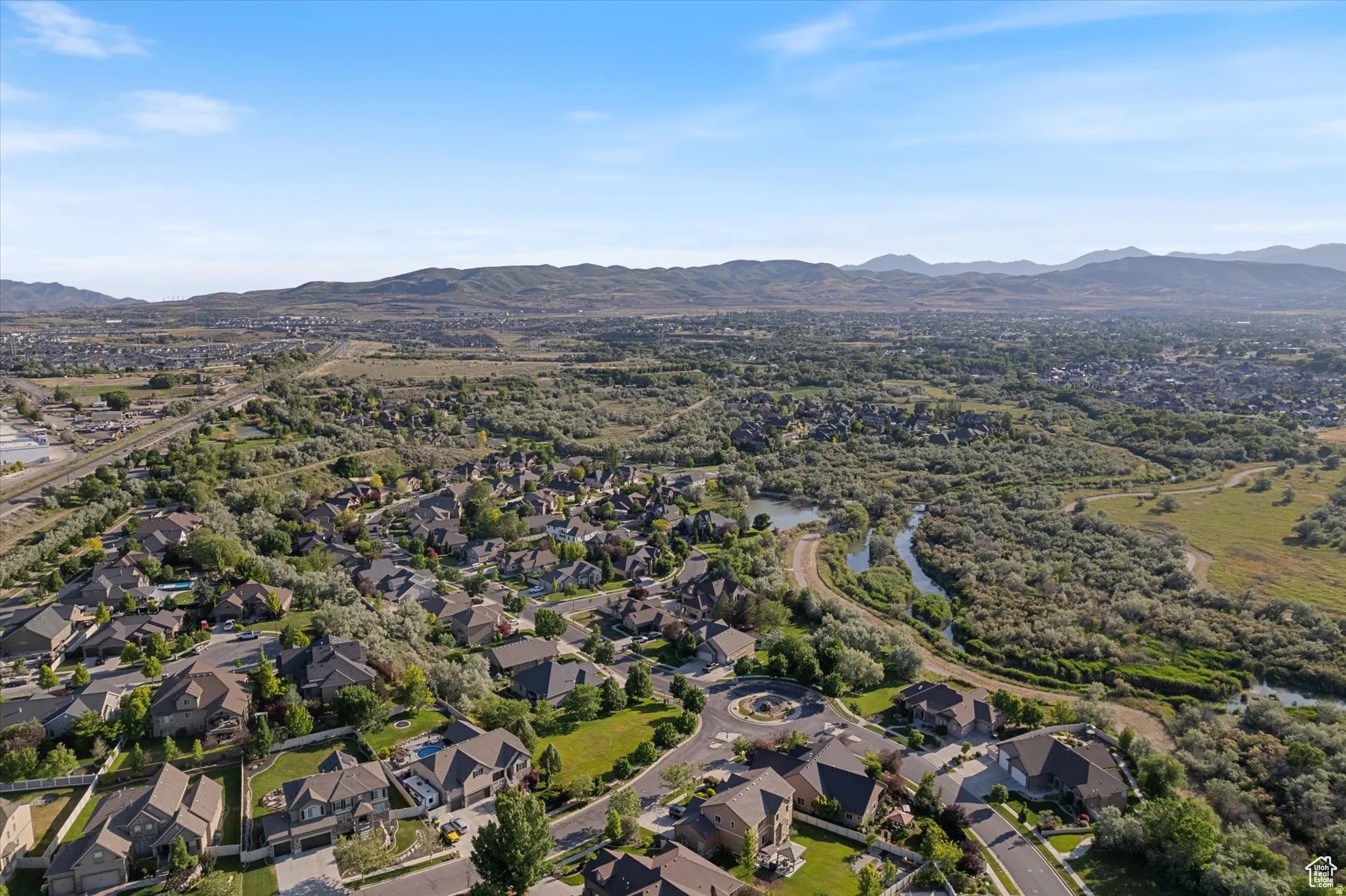 Aerial view of residential area with a mountain backdrop