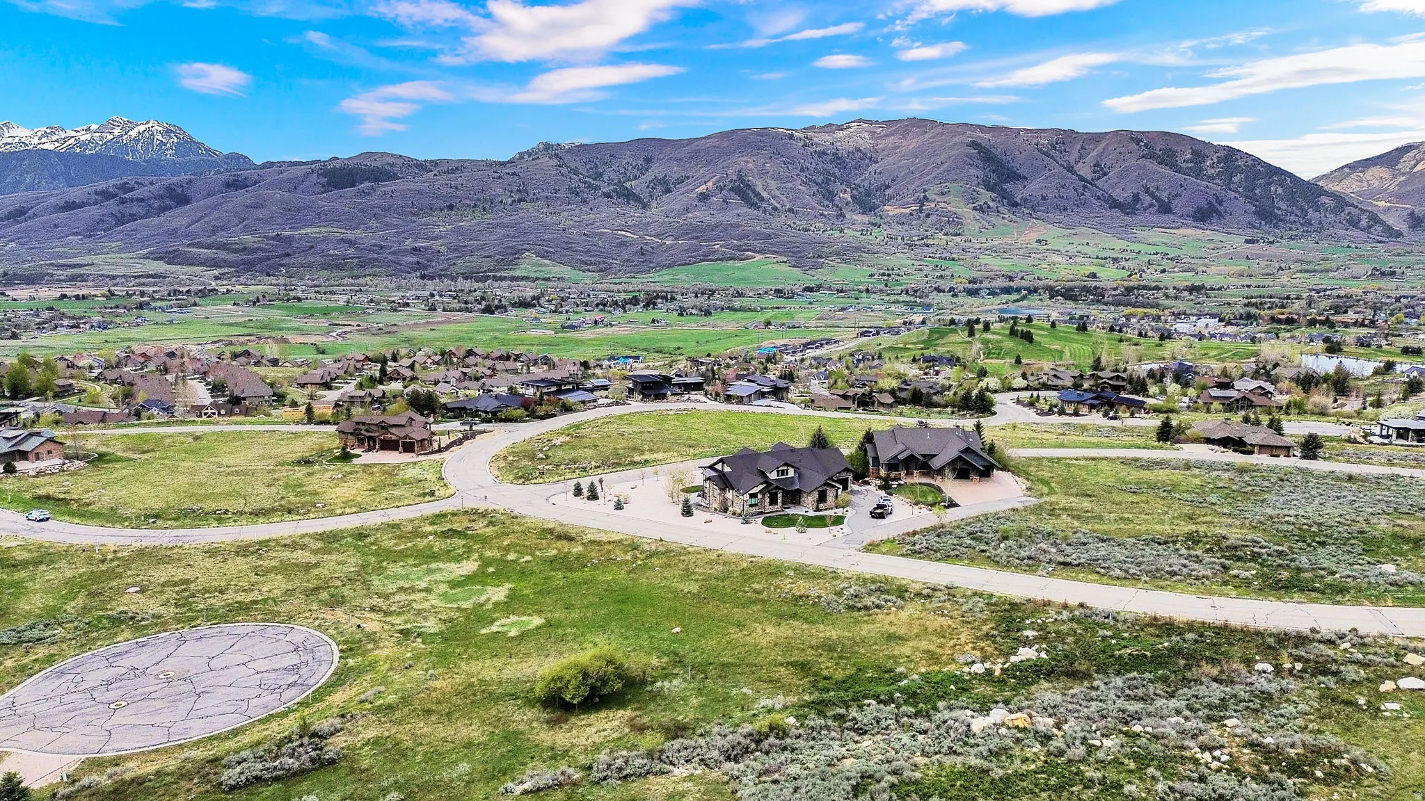 Mountain view featuring nearby suburban area