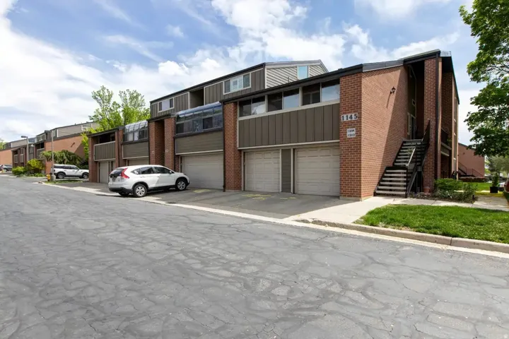 View of apartment building / complex with stairway