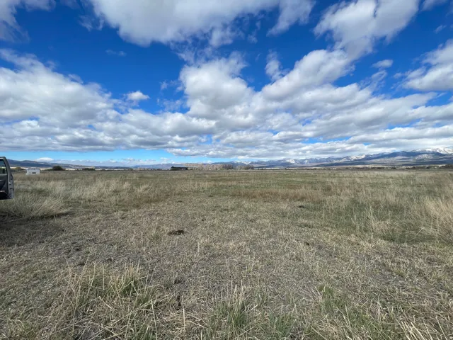 View of nature featuring rural landscape and a mountainous background