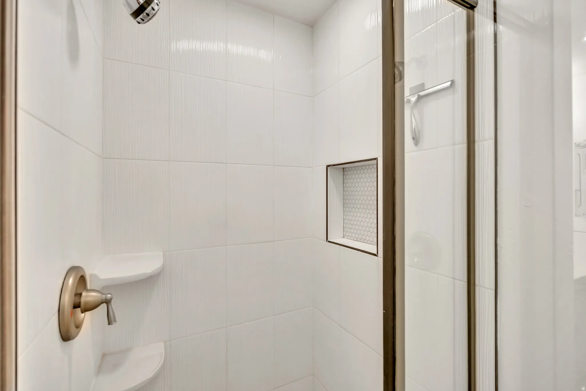 Bathroom featuring a stall shower