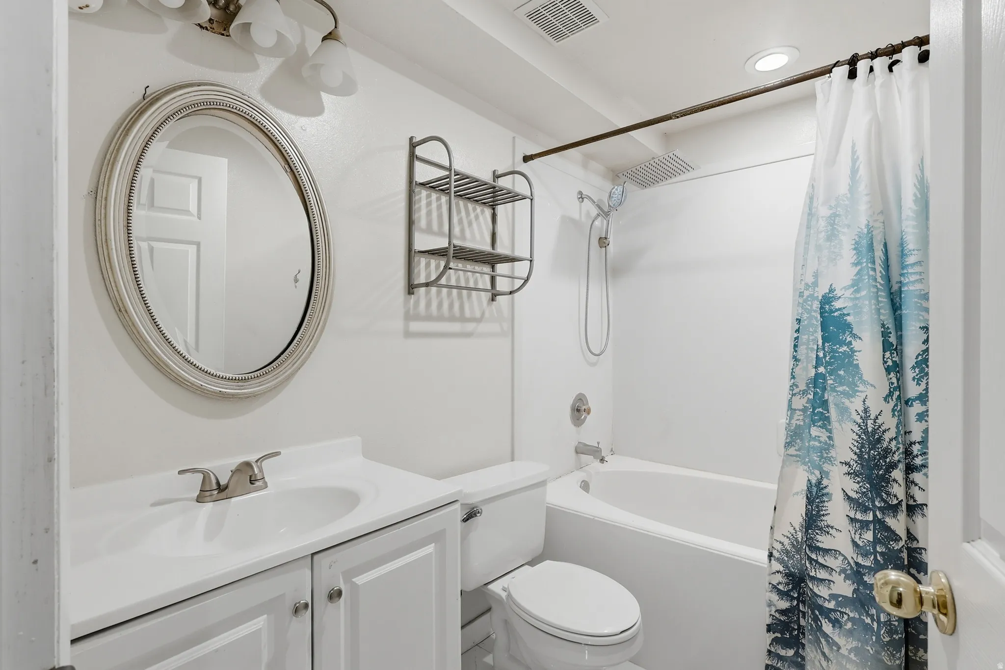Full bath with vanity, shower / bath combination with curtain, and recessed lighting