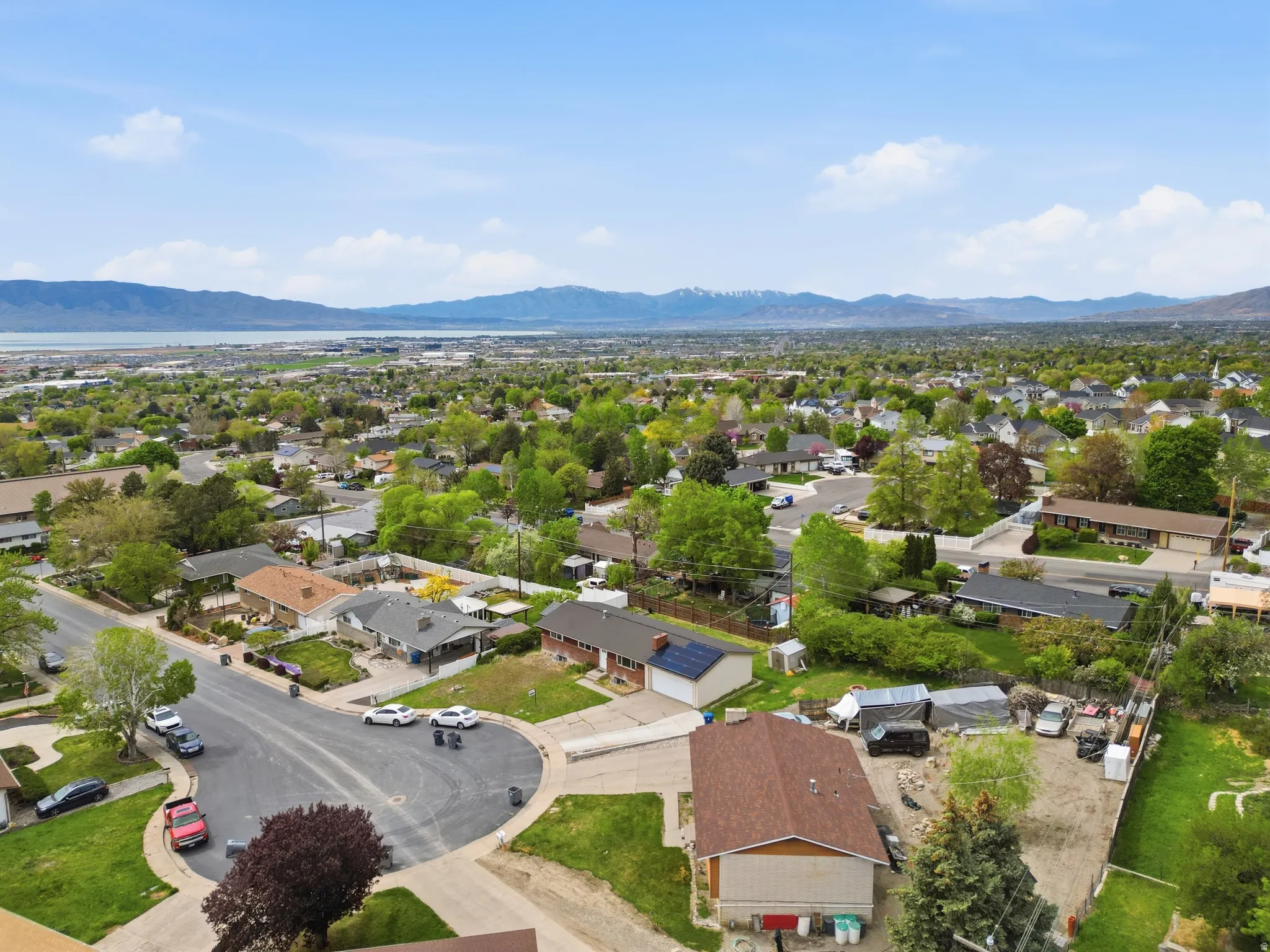 Aerial view of residential area with a mountain backdrop