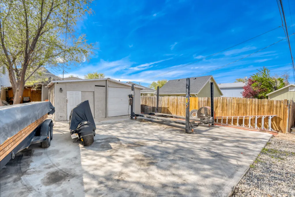 Garage featuring driveway