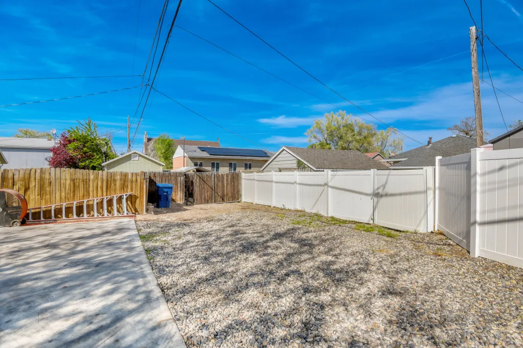 View of fenced backyard