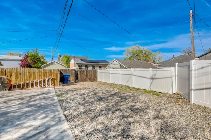 View of fenced backyard