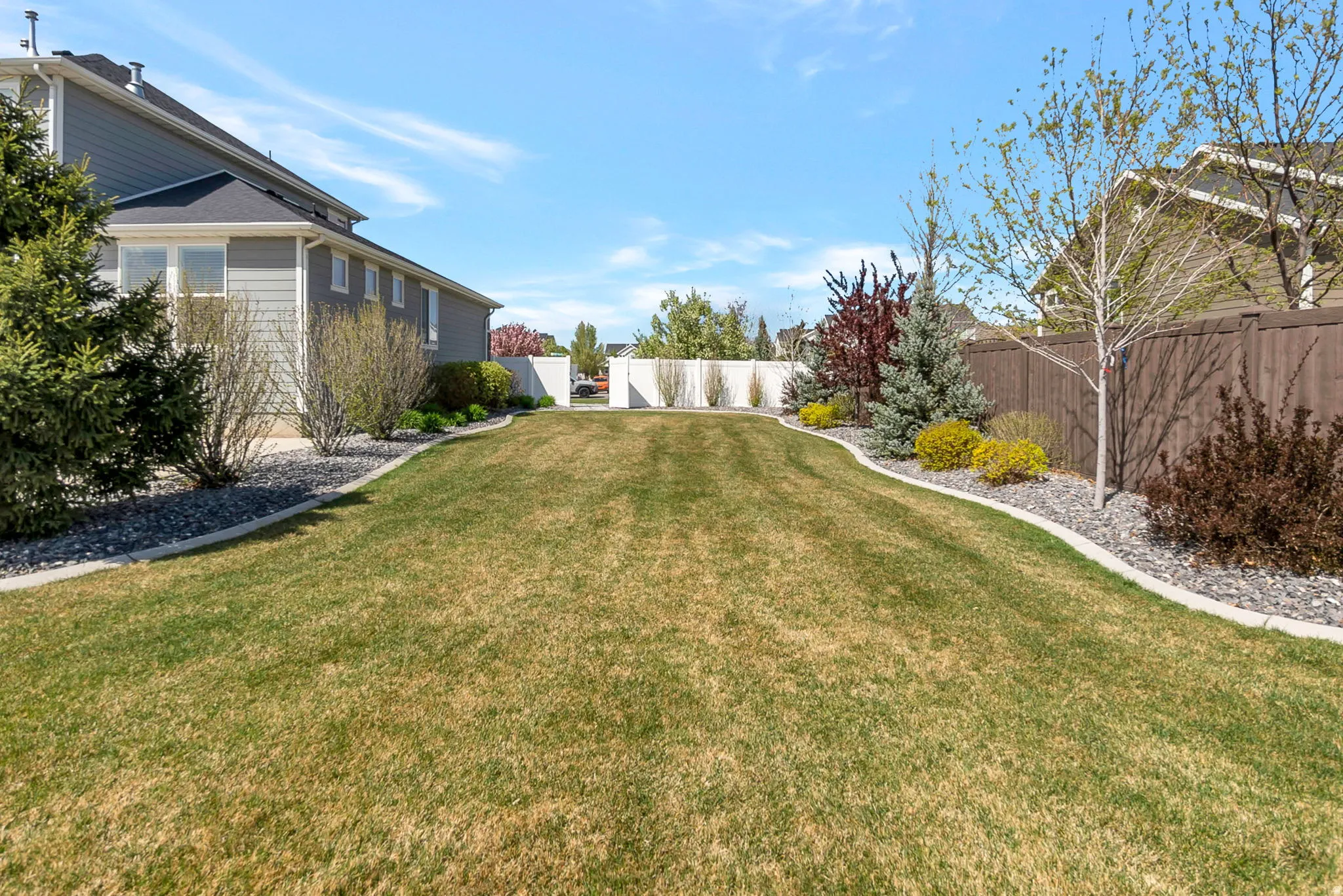 Such a variety of plantings throughout the yard!