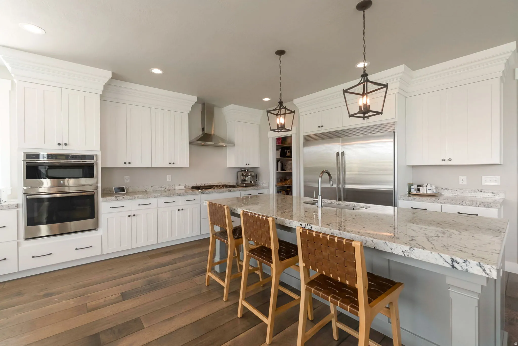 Custom kitchen! Check out the detailed wood work and upgraded appliances!