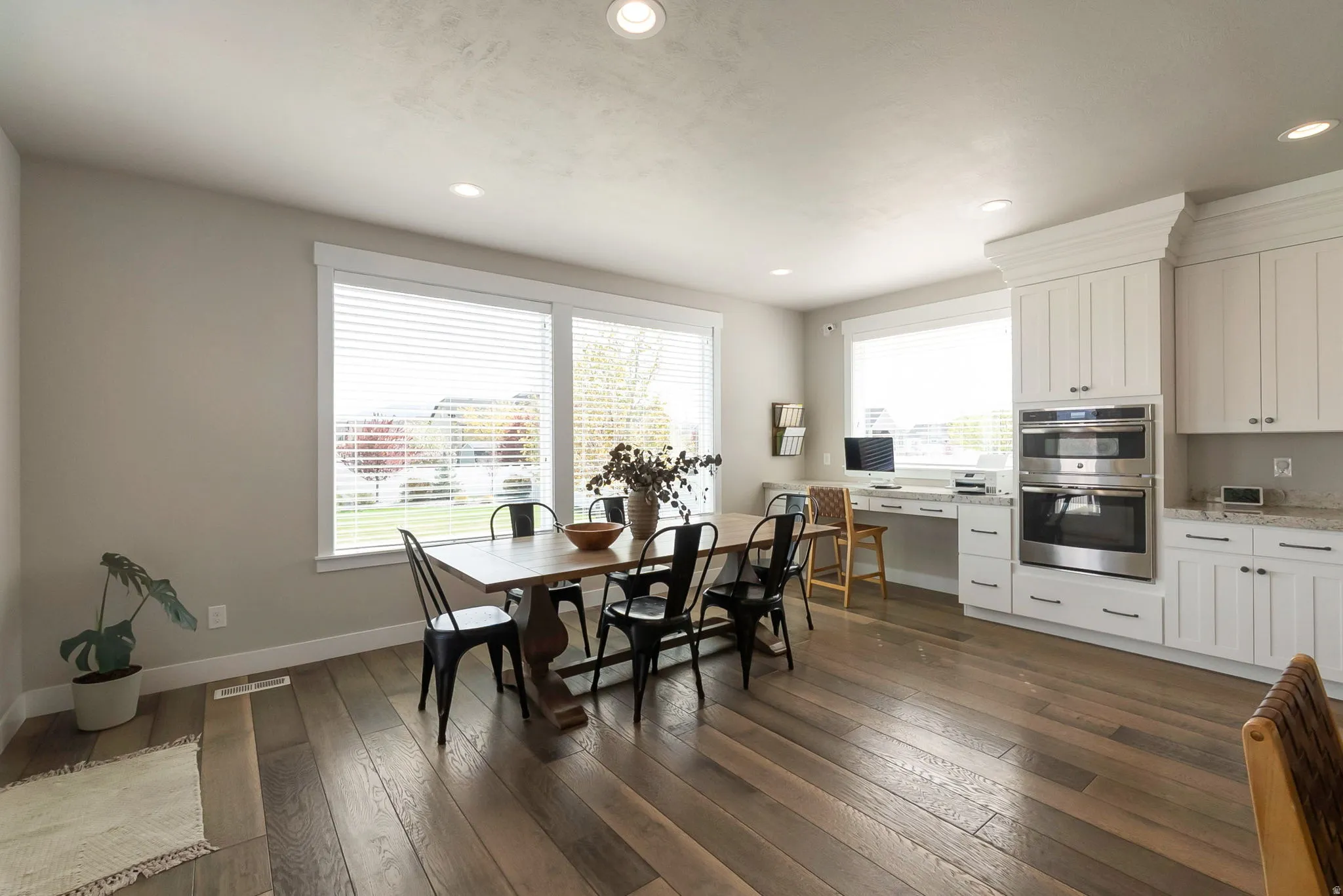 You could seat a lot of people in this dining room! Notice family computer center.