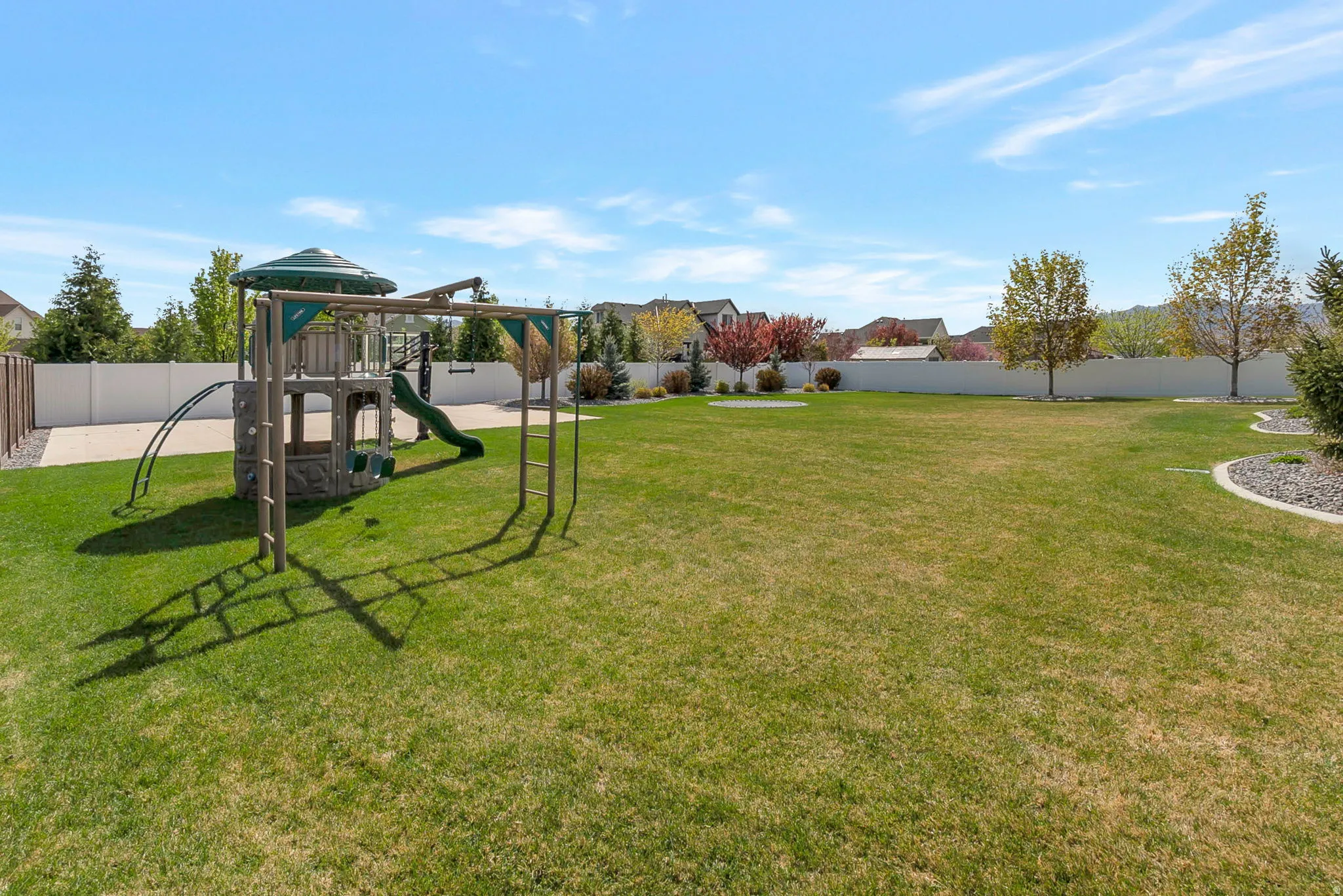 Fenced backyard for the kids.