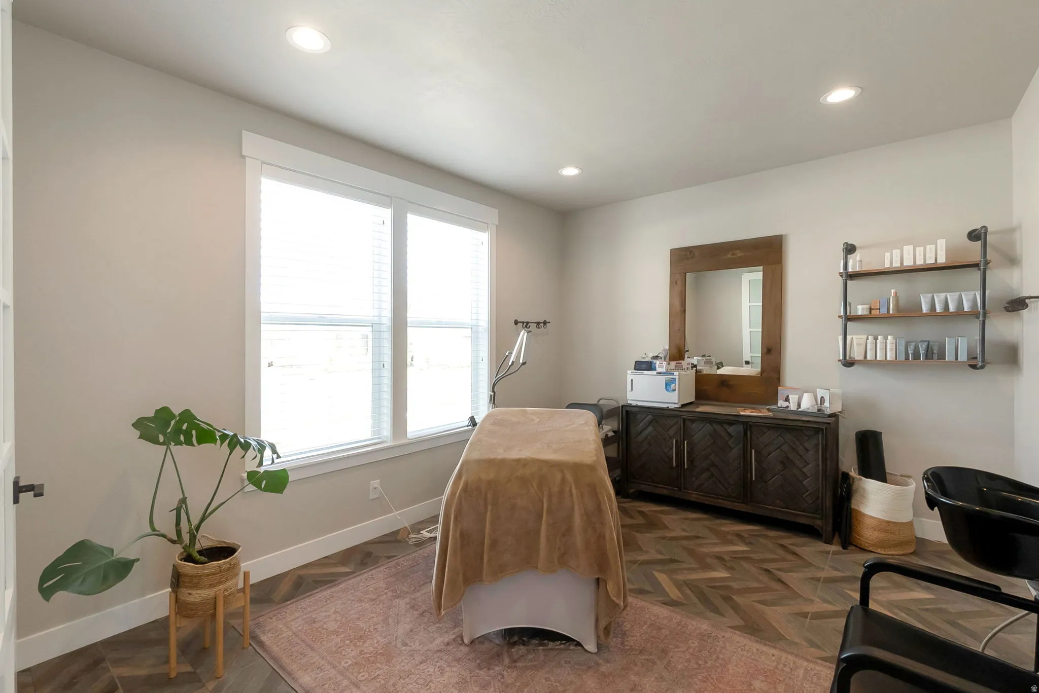 Home office off the entry.  Privacy doors.  Notice the sink on the wall.