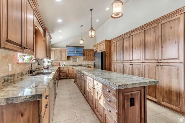 Kitchen featuring lofted ceiling, TWO DISHWASHERS AND DOUBLE WALL OVEN