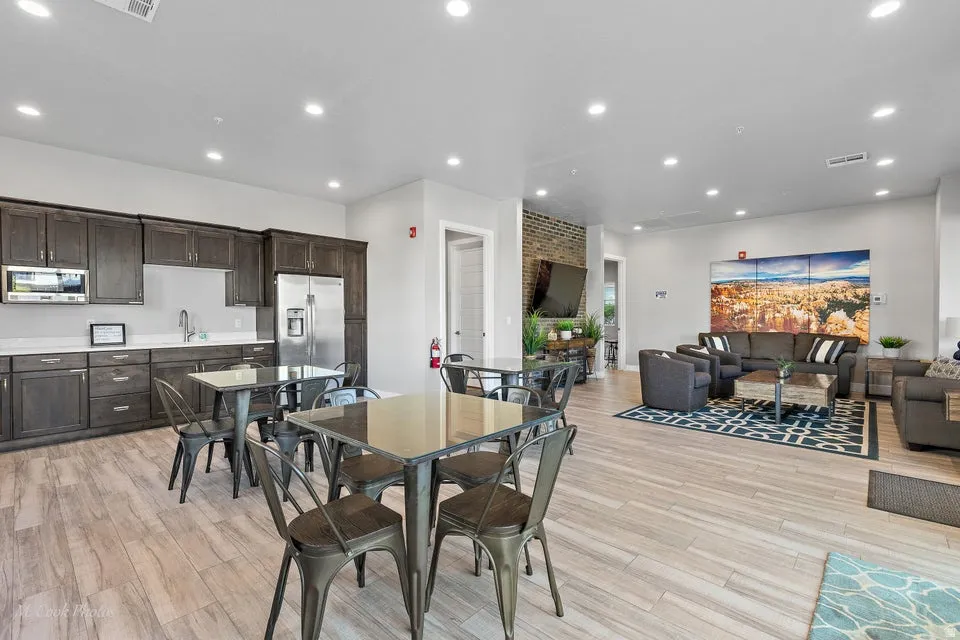 Dining area featuring light wood-style floors and recessed lighting