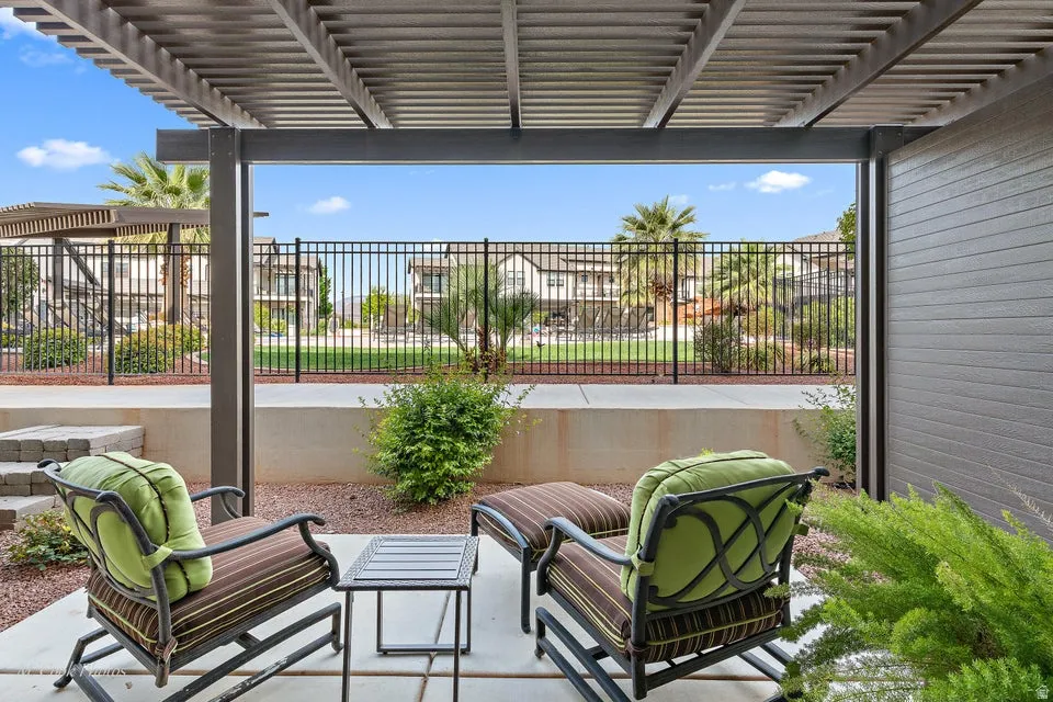 View of patio featuring a pergola
