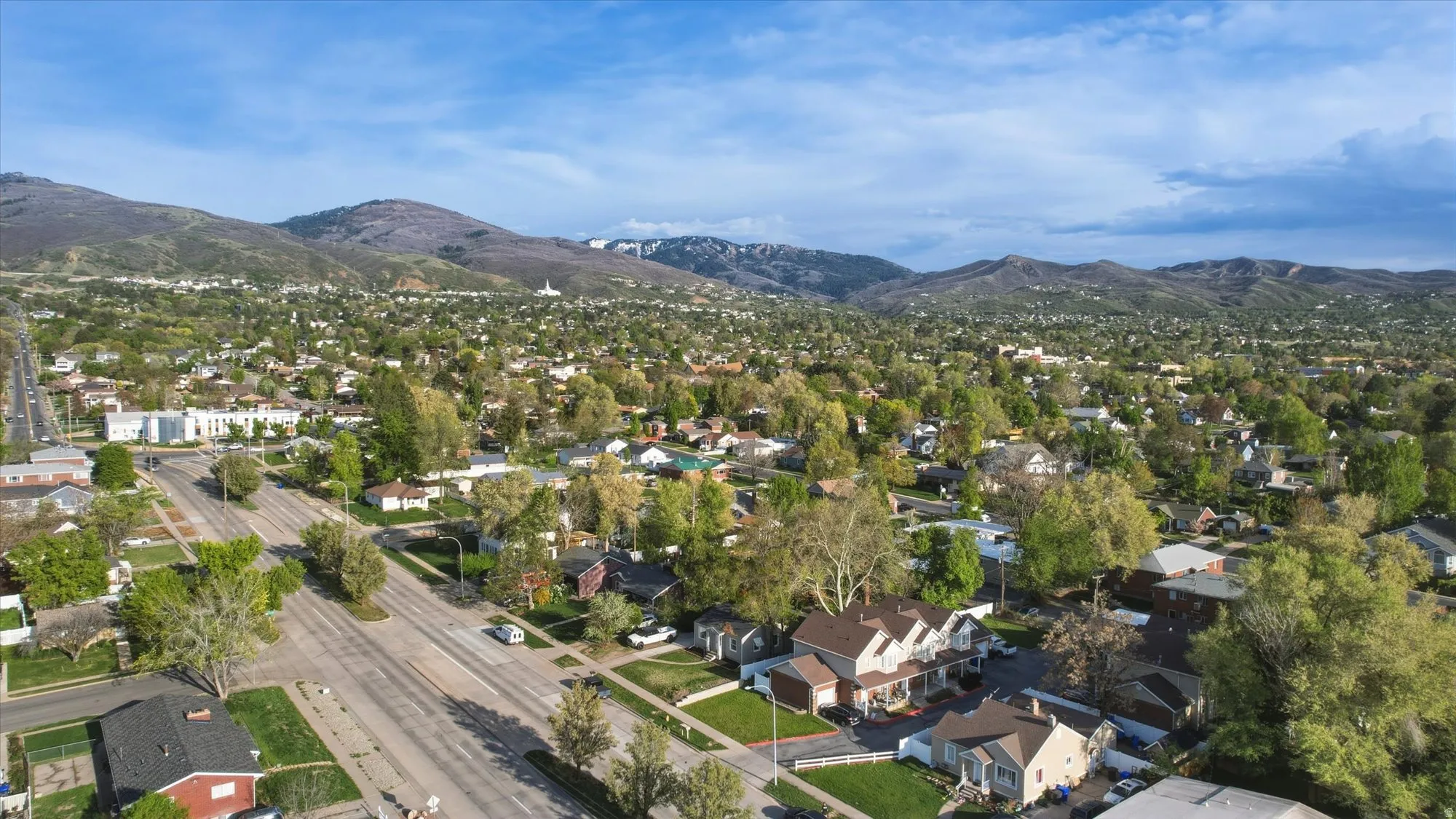 Aerial view of residential area with mountains