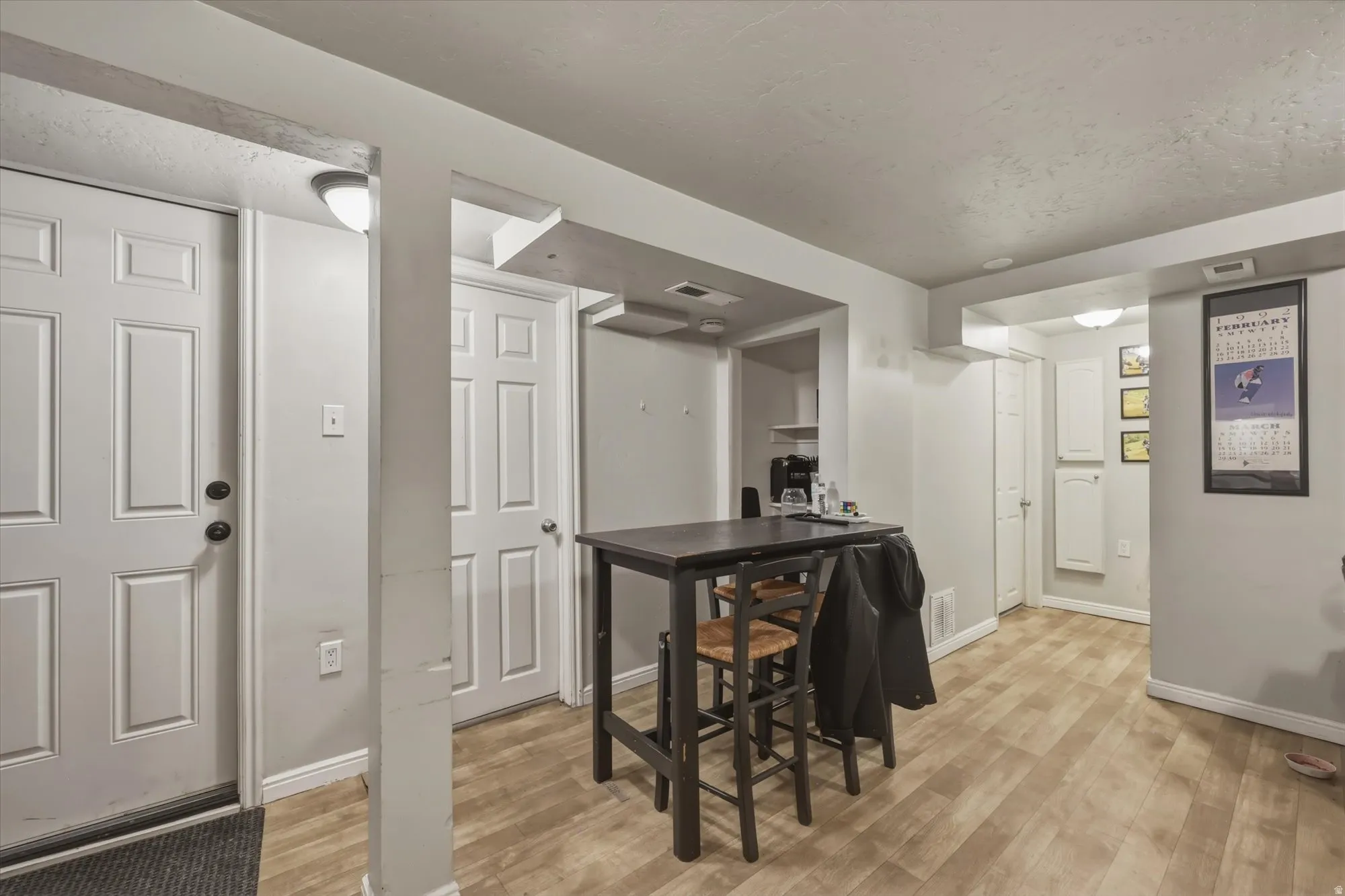 Dining space featuring light wood finished floors