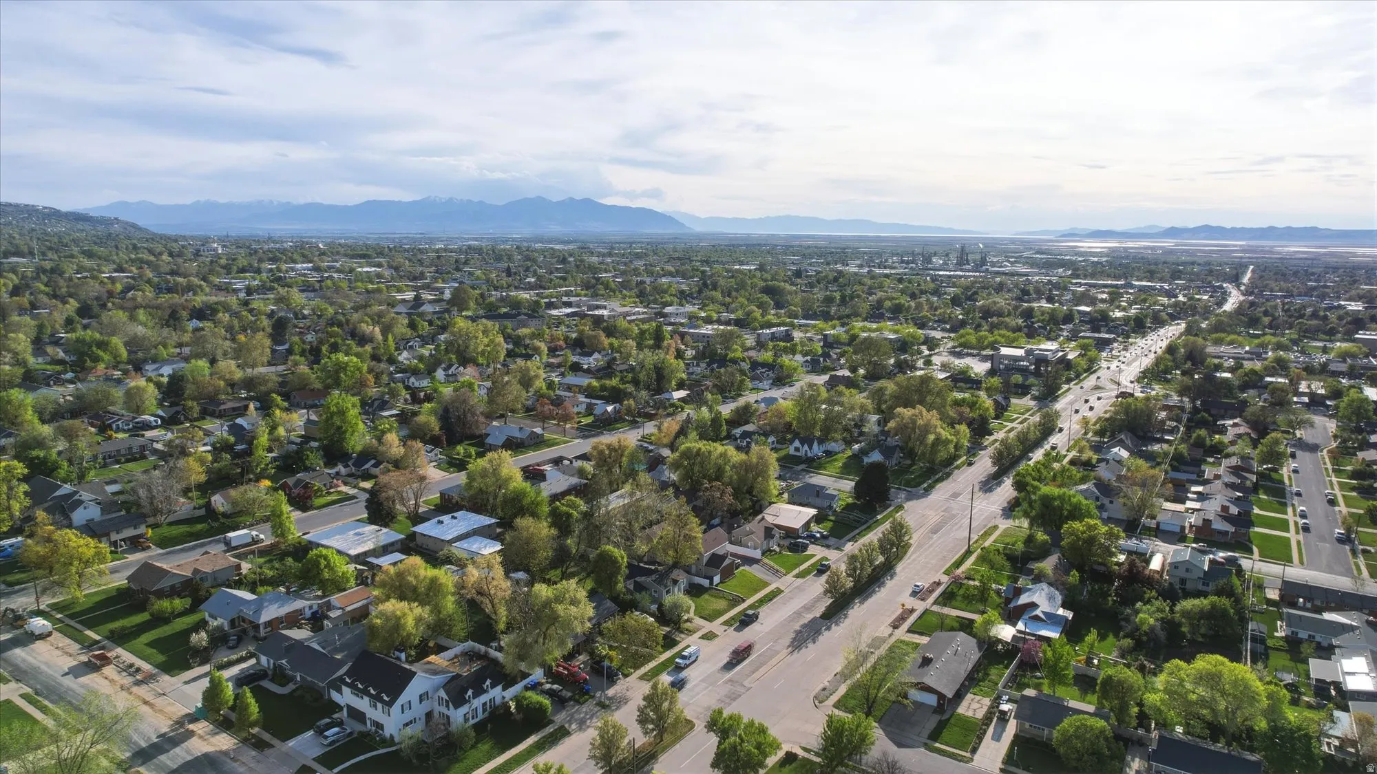 Aerial perspective of suburban area featuring mountains