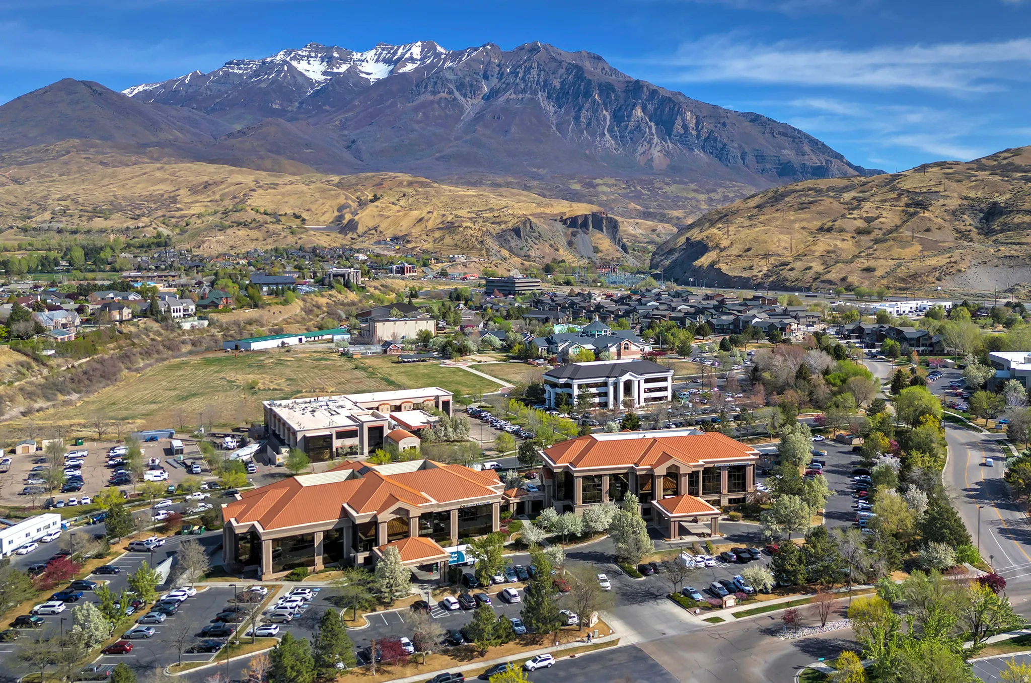 Aerial view of residential area with mountains