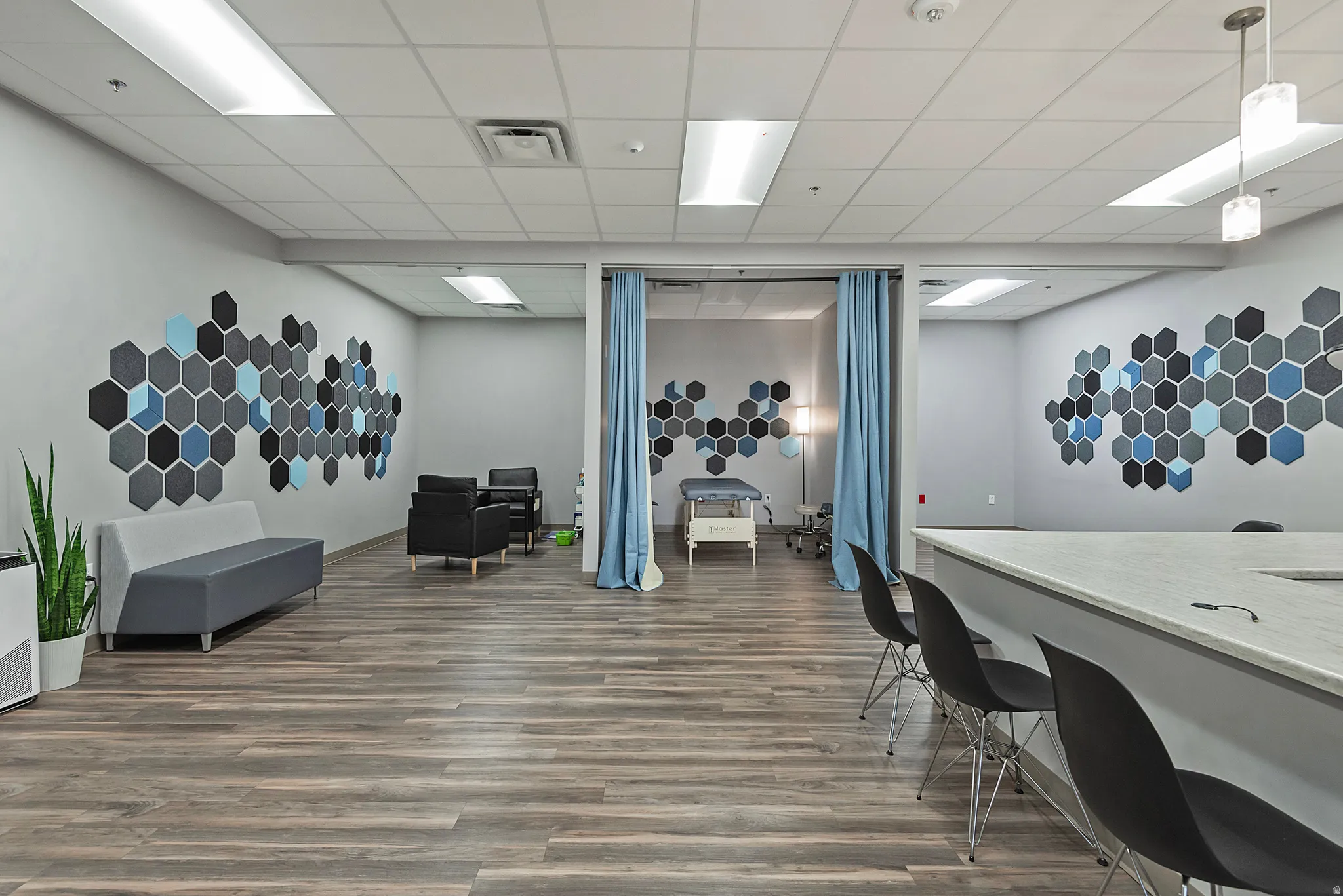 Office with a paneled ceiling