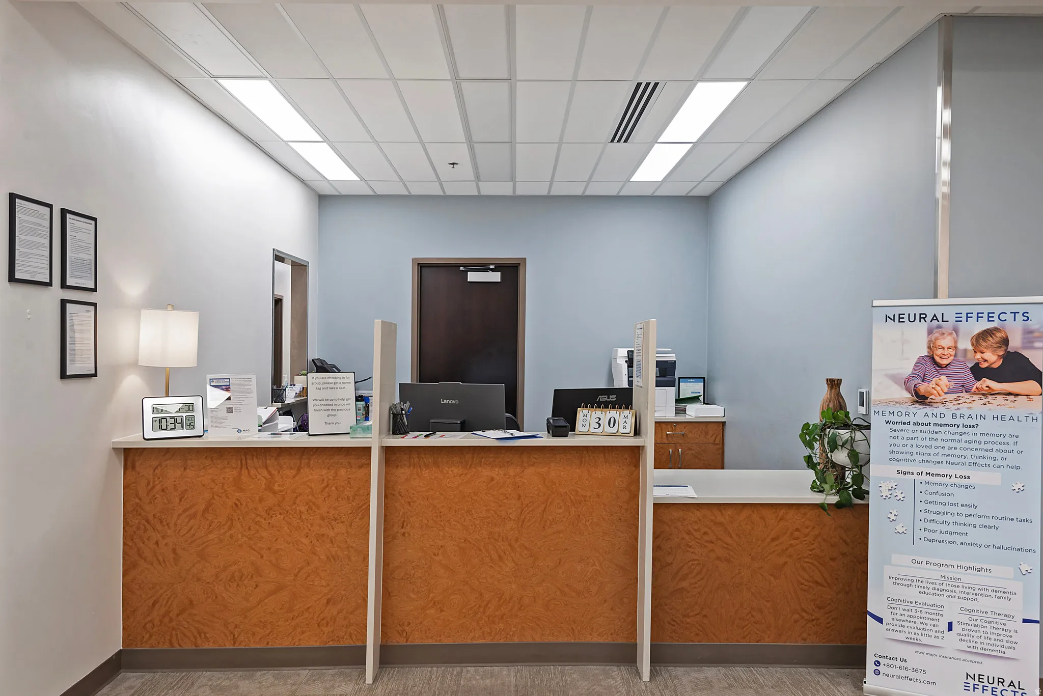 Welcome area featuring a drop ceiling