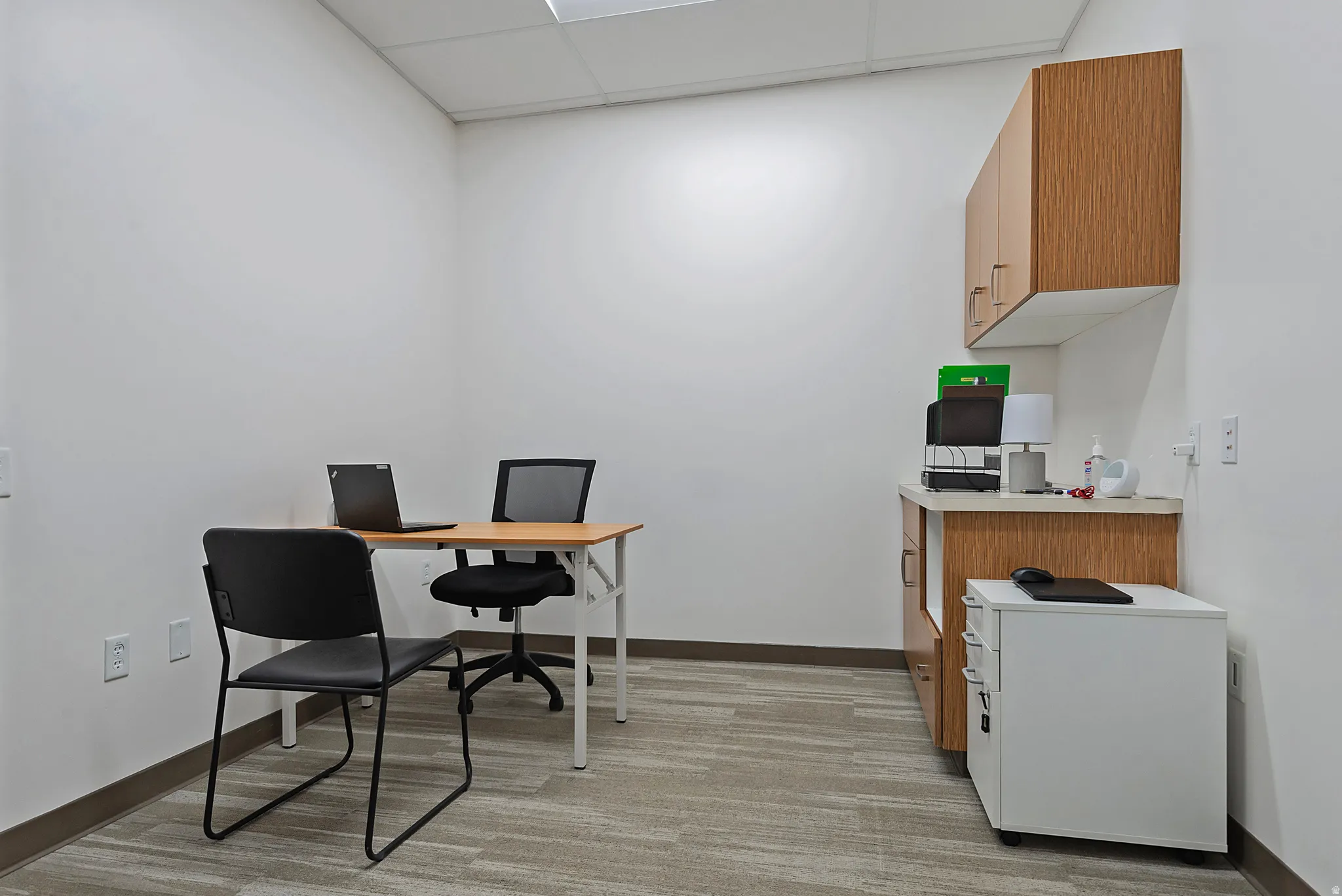 Home office featuring a paneled ceiling
