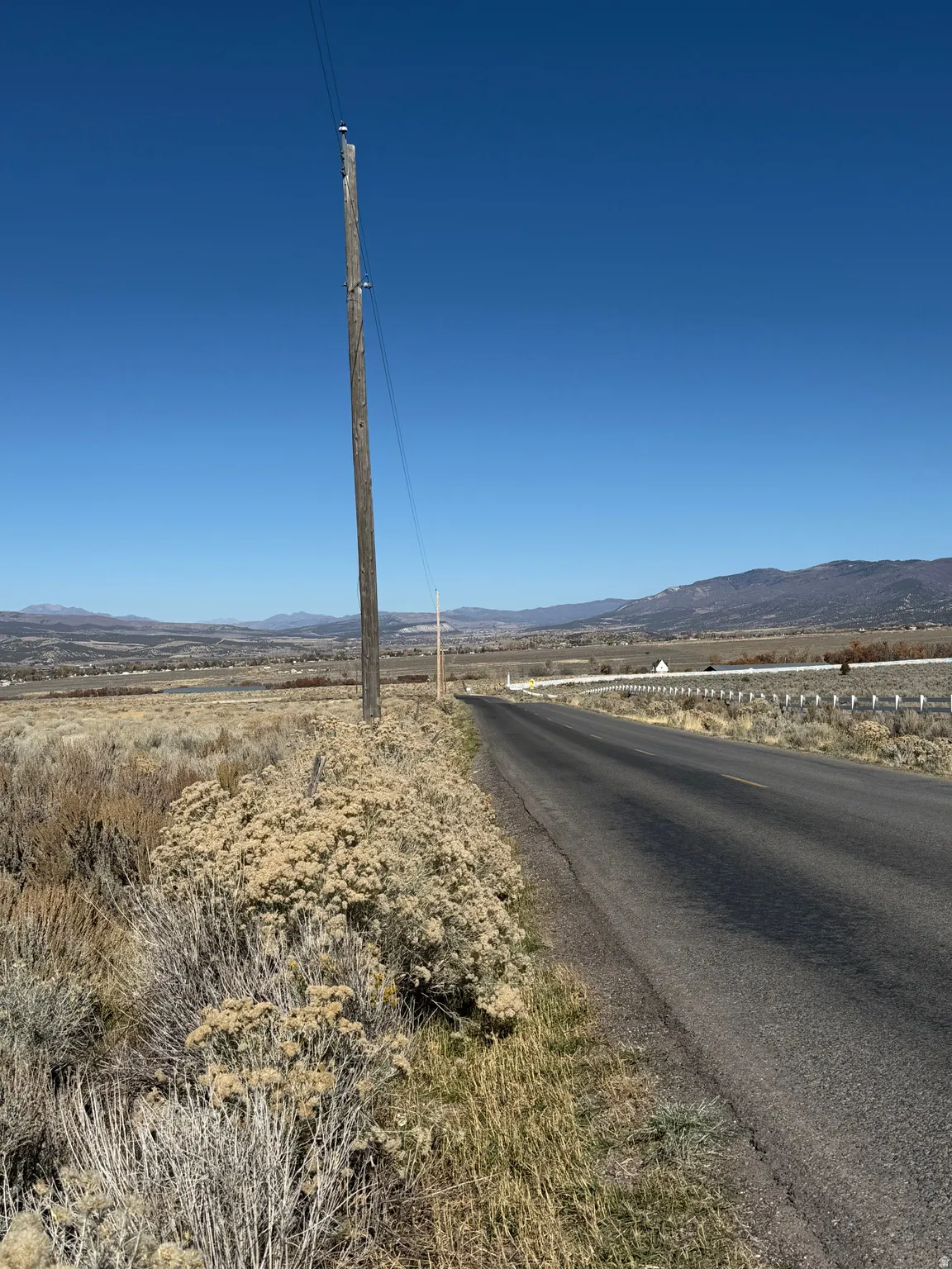 View of asphalt road featuring a mountain view