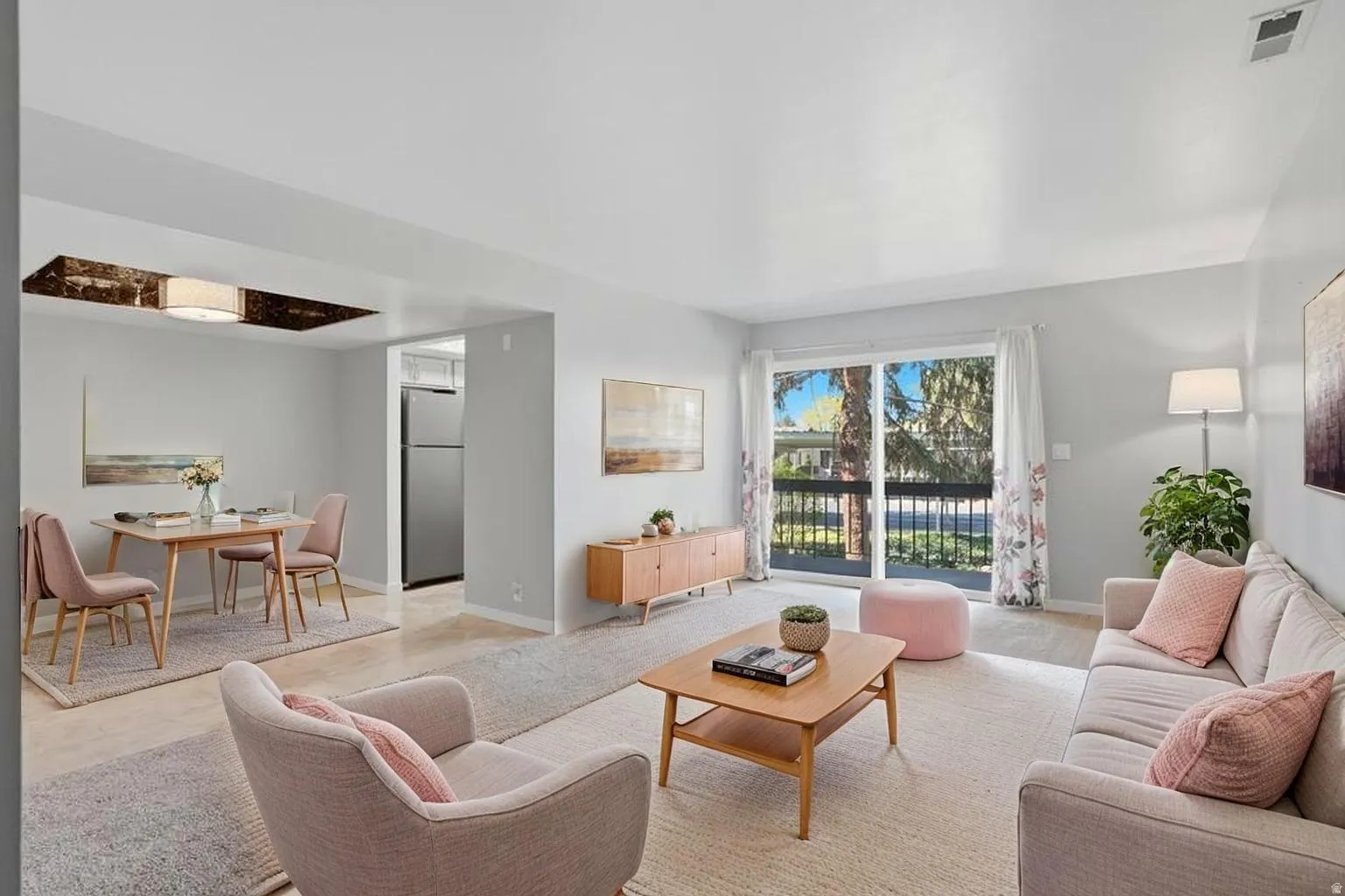Living area featuring baseboards