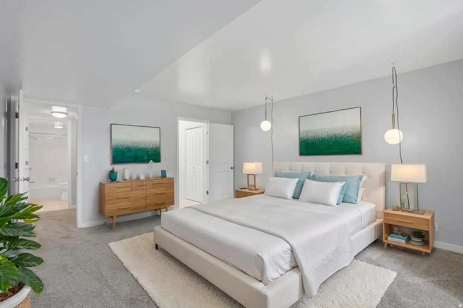 Carpeted bedroom featuring baseboards
