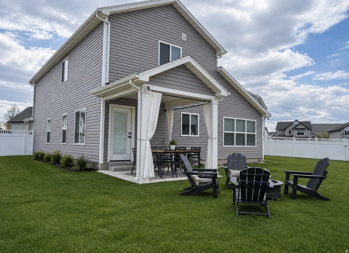 Rear view of property with a patio area