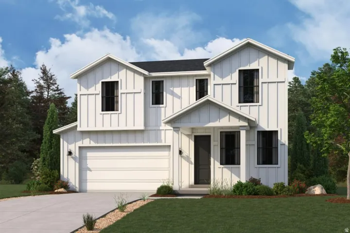 Modern farmhouse featuring board and batten siding, a garage, driveway, and a front lawn