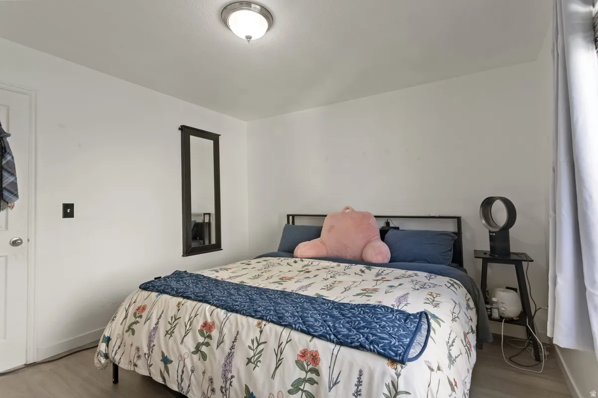 Bedroom featuring light wood-type flooring