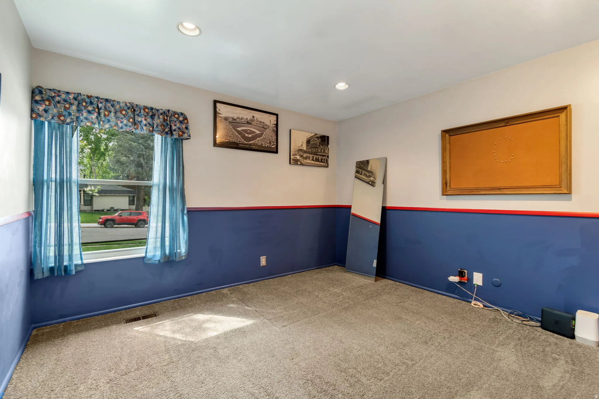 Spare room with carpet floors and recessed lighting