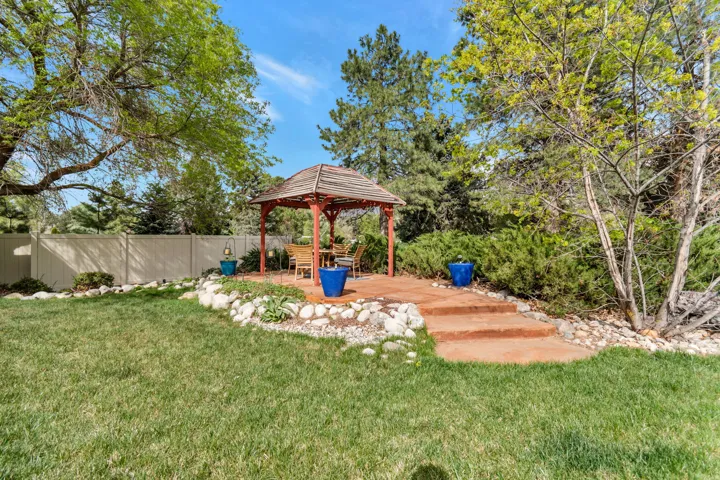 View of yard featuring a gazebo and a patio