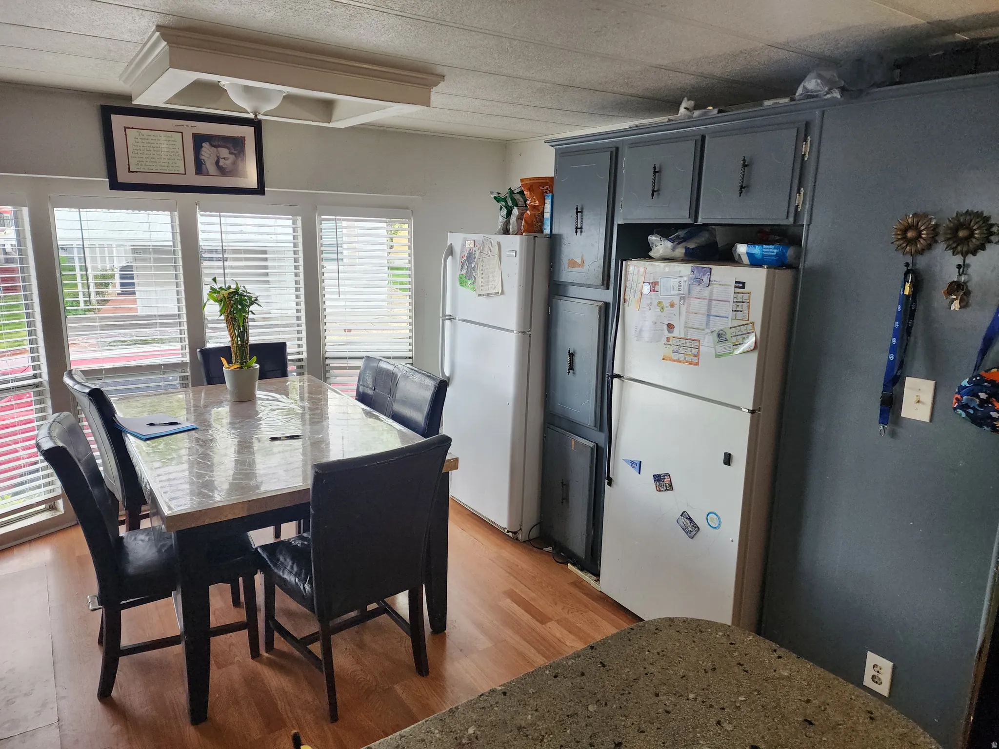 Dining area featuring light wood finished floors