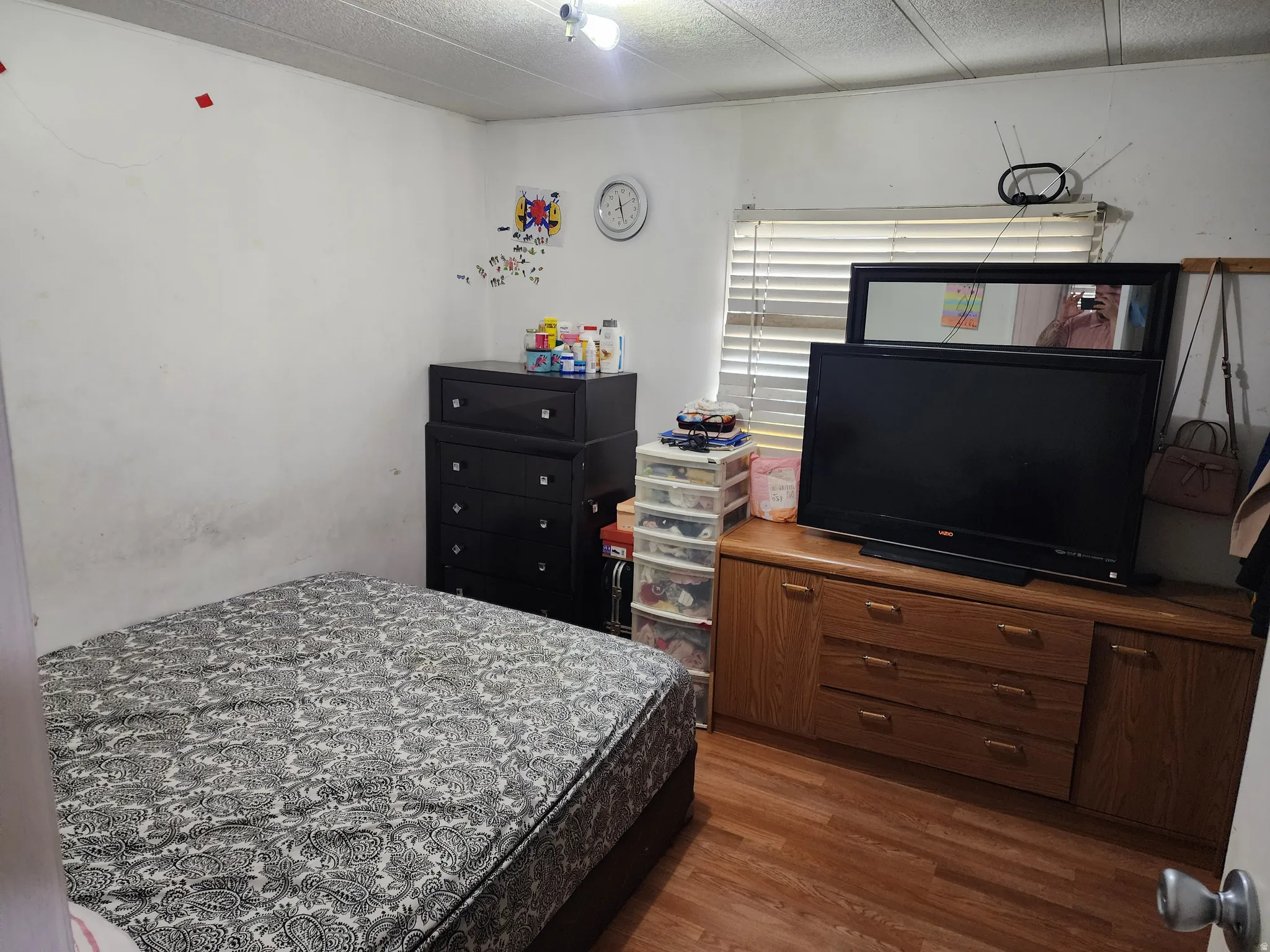 Bedroom featuring dark wood finished floors