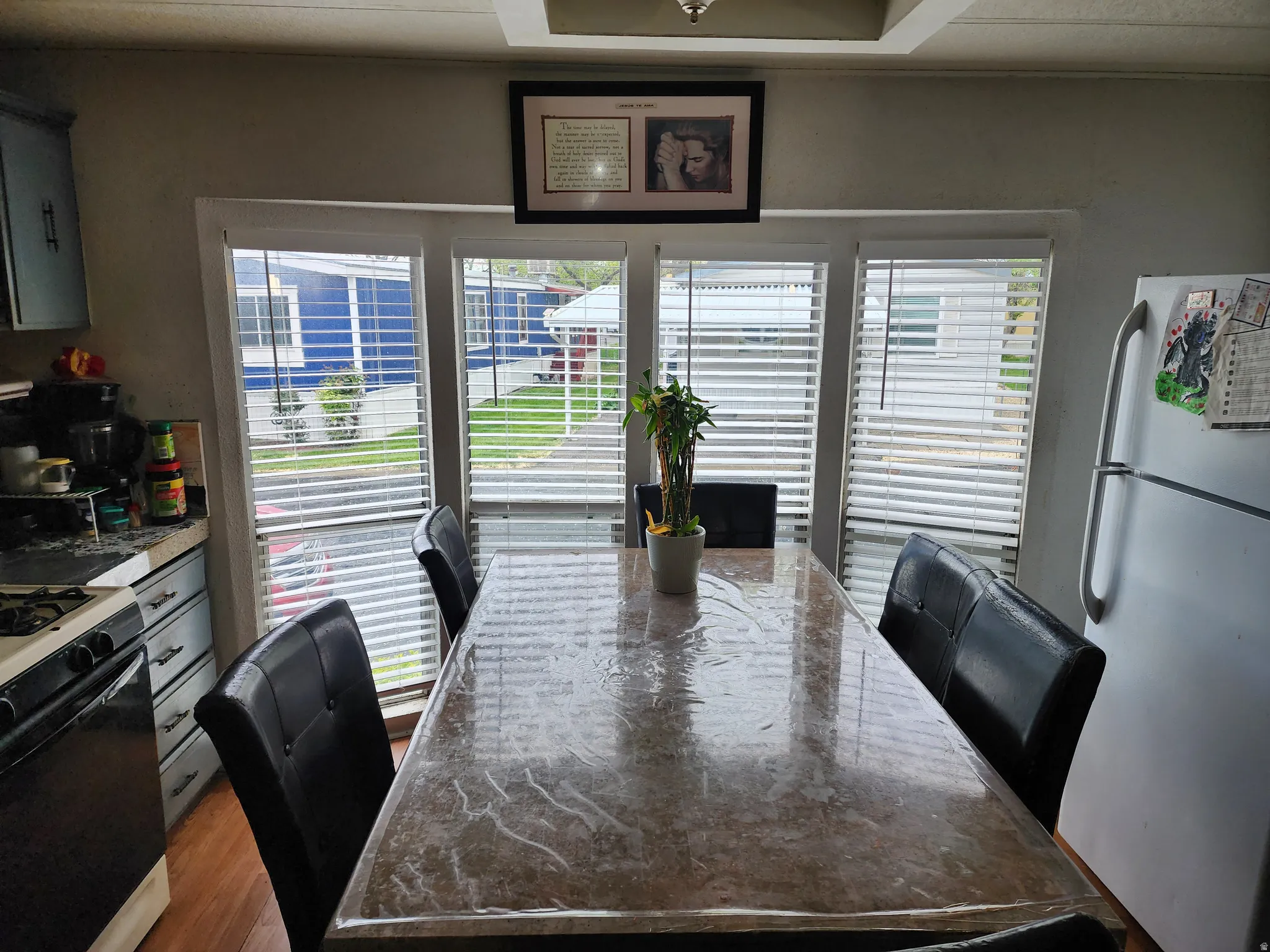 Dining area with dark wood finished floors