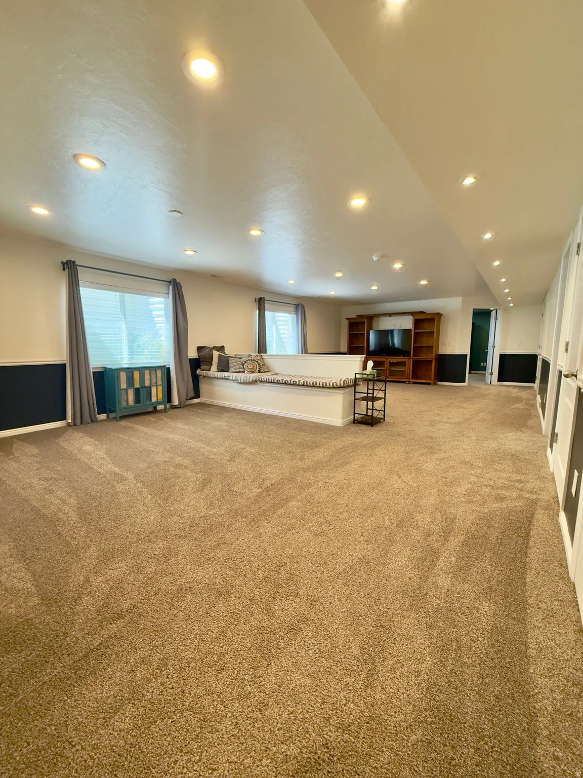 Misc room featuring light carpet and recessed lighting
