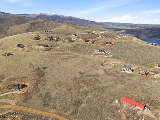 Aerial overview of property's location featuring mountains and rural landscape