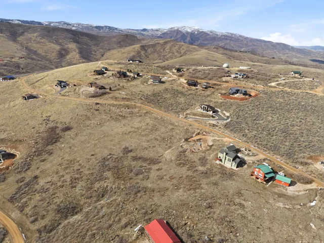 View of property location with a mountain backdrop and rural landscape